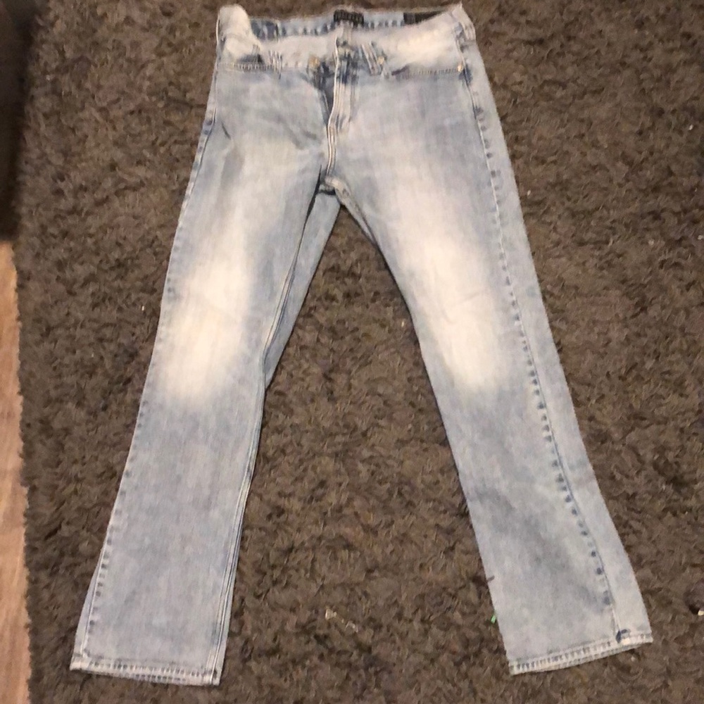 There light grey and white jeans
